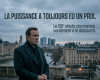 Man overlooking city with text: LA PUISSANCE A TOUJOURS EU UN PRIX. Le XXIe siècle commence seulement à le découvrir.