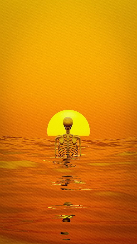 A skeleton floating in the ocean at sunset